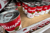 Cans of Campbell's cream of mushroom soup line a supermarket shelf in Bellingham