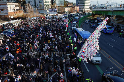 Pro-Yoon protesters rally near impeached South Korean President Yoon Suk Yeol's official residence in Seoul