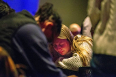 Worshipers at Blackhawk Church gather to pray for victims and survivors of a shooting in Madison