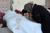 Funeral of Palestinians killed in Israeli strikes at Al-Aqsa Martyrs Hospital in Deir Al-Balah in the central Gaza Strip