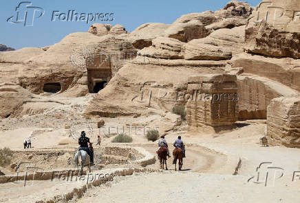 People visit the ancient city of Petra