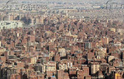 FILE PHOTO: View of buildings from plane window over Cairo
