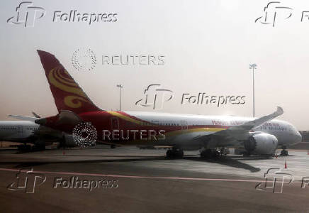 Hainan Airlines airplane is parked at Cairo International Airport