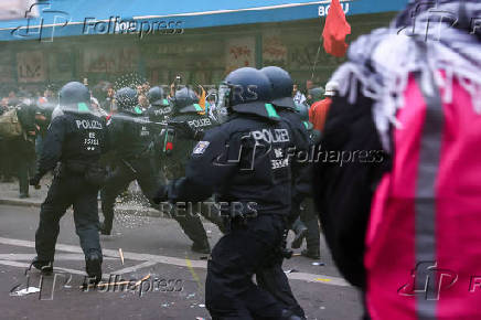 Protesters attend a demonstration in support of Palestinians, in Berlin