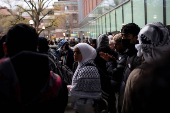 Protest in front of the residence of the University of Michigan's president, in Ann Arbor