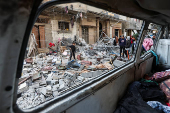 Aftermath of Israeli strike on a house in Nuseirat in the central Gaza Strip