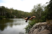 People cool off at Lake Parramatta, near Sydney