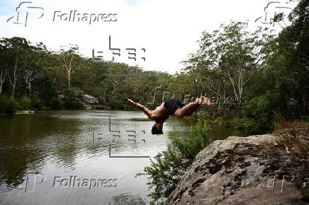 People cool off at Lake Parramatta, near Sydney