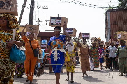 Boxes of supplies are distributed to the poor in Lagos