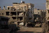 Damaged buildings are pictured in southern Gaza Strip