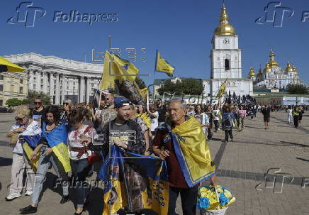 Ukrainians take part in procession for the 'Day of Defenders of Ukraine' in Kyiv