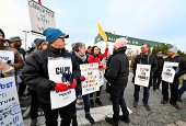 Jagmeet Singh joins striking Canada Post workers on the picket line in Surrey