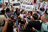 Relatives of detained Venezuelans protest outside the public prosecutor?s headquarters, in Caracas