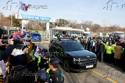 Scenes from outside the Seoul Detention Center in Uiwang