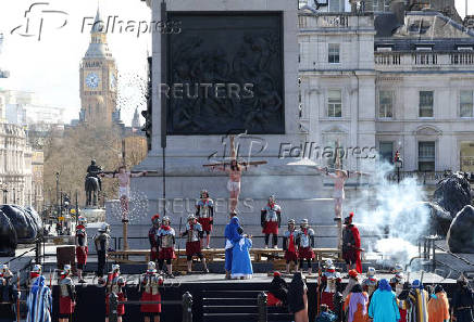 Members of the Wintershall Players theatre company perform The Passion of Jesus in Trafalgar Square, London