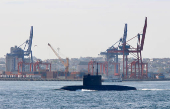 FILE PHOTO: Russian Navy's improved kilo-class submarine Kolpino sails in the Bosphorus, on its way to the Black Sea, in Istanbul