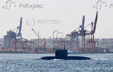 FILE PHOTO: Russian Navy's improved kilo-class submarine Kolpino sails in the Bosphorus, on its way to the Black Sea, in Istanbul