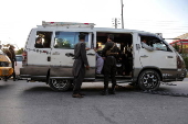 Afghans Taliban conduct checks on people and vehicles at checkpoints in Kabul