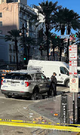 Police attend the scene where a pickup truck drove into a large crowd on Bourbon Street