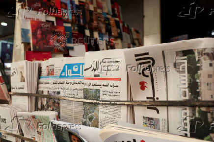 Copies of newspapers are displayed for sale in Beirut