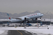 FILE PHOTO: Air Canada plane takes off from Vancouver International Airport in British Columbia, Canada