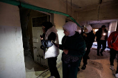 People visit Sednaya prison, which was known as a slaughterhouse under Syria's Bashar al-Assad rule in Sednaya