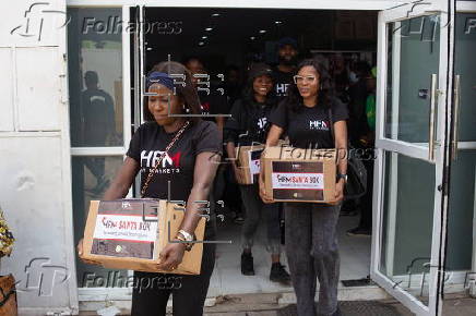 Boxes of supplies are distributed to the poor in Lagos