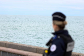 Security and rescue forces are seen on the beach of Wimereux, near Calais