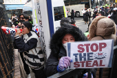 Pro-Yoon protesters participate in a rally outside a court, in Seoul