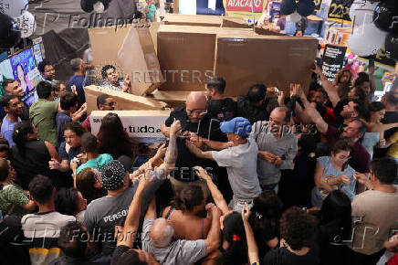 People shop ahead of Black Friday in Brazil