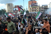 Celebrations in Tripoli after Syrian rebels capture Damascus and overthrow al-Assad