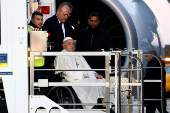 Pope Francis boards the papal plane for his apostolic visit to Corsica, at Fiumicino airport