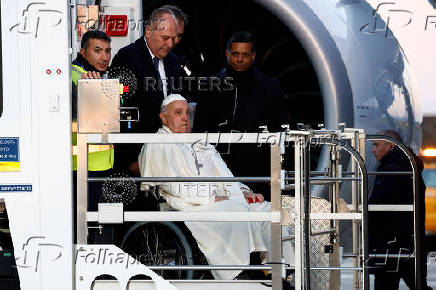 Pope Francis boards the papal plane for his apostolic visit to Corsica, at Fiumicino airport