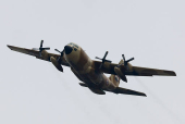 An Egyptian military plane that air-dropped humanitarian aid in the Gaza Strip flies over Israel