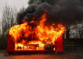 Fire department in Berlin demonstrates fire hazard from Christmas tree candles