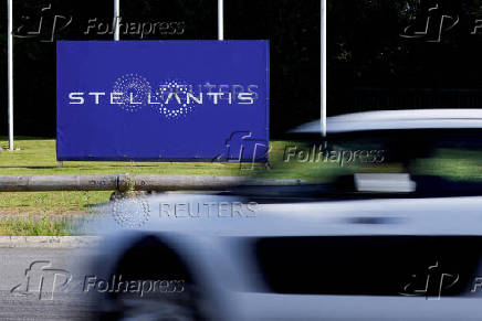 FILE PHOTO: The logo of Stellantis at the entrance of the company's factory in Hordain