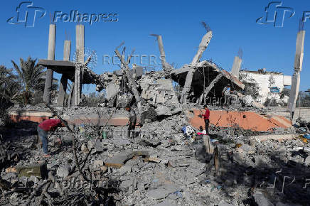 Aftermath of an Israeli strike on a house, in Deir Al-Balah in the central Gaza Strip