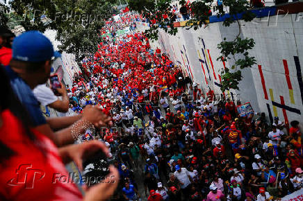 People attend a rally marking the anniversary of the ending of Marcos Perez Jimenez's dictatorship