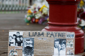 Flowers and tributes are placed at the bandstand in West Park to remember former One Direction singer Liam Payne, in Wolverhampton