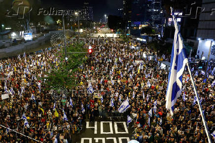 People rally demanding the release of hostages kidnapped during the deadly October 7, 2023 attack, in Tel Aviv