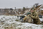 Ukrainian civilians undergo basic military training in Kharkiv