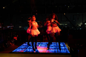 Performers dance inside a night club in Lagos