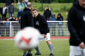 French President Macron participates in the Varietes Club charity football match in Plaisir