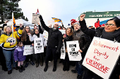 Jagmeet Singh joins striking Canada Post workers on the picket line in Surrey