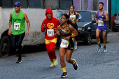 Venezuelans participate in the 9th CAF Caracas Marathon 2025, in Caracas