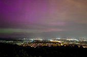 An aurora borealis is seen from Harmashatar Hill in Budapest