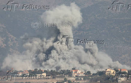 Smoke billows over Khiam