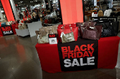 Black Friday sale signs are shown at Macy?s department store