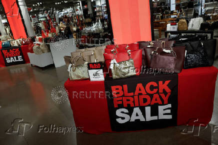 Black Friday sale signs are shown at Macy?s department store