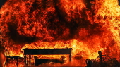 Fire department in Berlin demonstrates fire hazard from Christmas tree candles